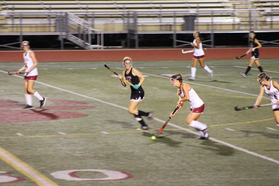 Kamryn Kinsey (10) dribbles past defense in the teams game against Torrey Pines. 