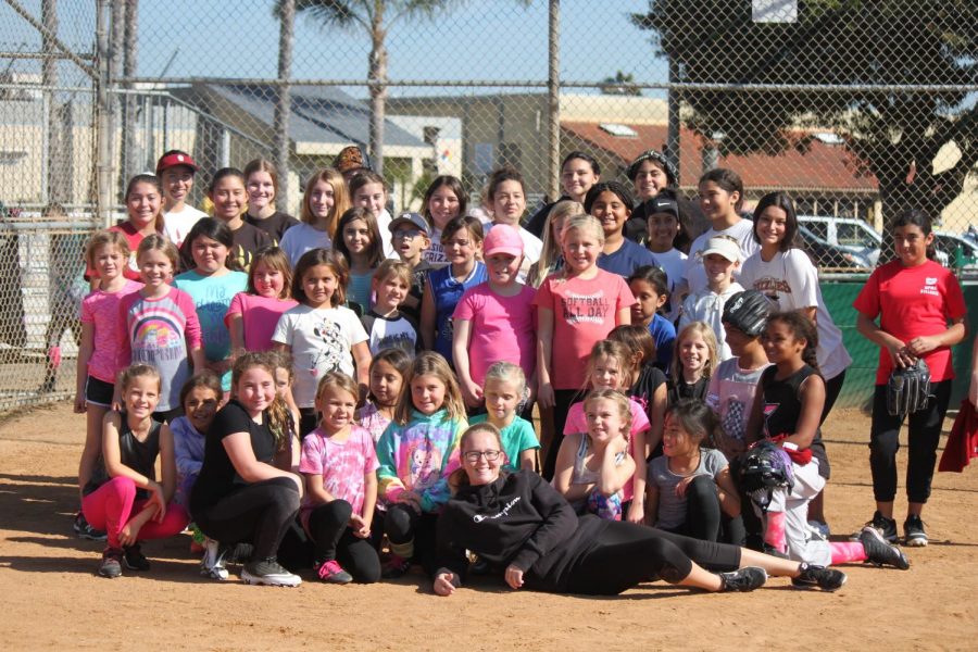 The team and kids share a picture after a day of progress, friendship, and fun!