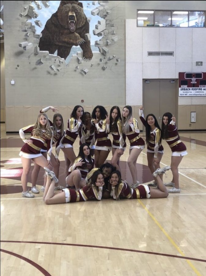 The Mission Hills High School competition cheer team for 2019-2020 flashes bright smiles. 