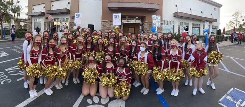Mission Hills JV and Varsity cheerleaders lead the rally at Chick-Fil-A and encourage everyone to say MHHS.