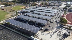 The Mission Hills student parking lot is filled with parent and student drivers as school comes to an end.