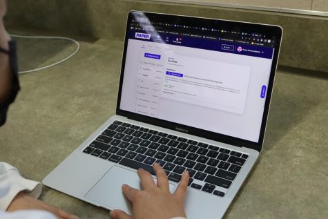 a student using the Paper application on their laptop