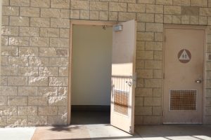 Campus supervisors are often found either inside the restroom or outside of the door.