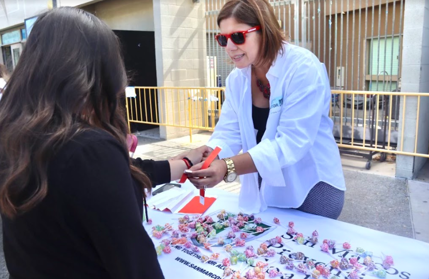 Students participate in the Red Ribbon Week Fair on campus.