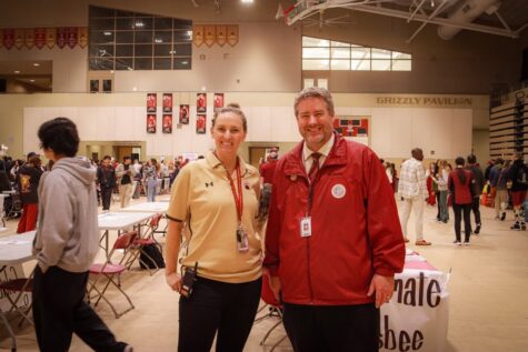 Assistant Principal Ryan and Principal Baker stand together at the Grizzly Showcase.