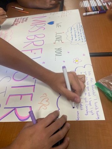 Social Justice Club focuses on teacher appreciation by making a poster for Mrs. Brewster, a math teacher on campus.
