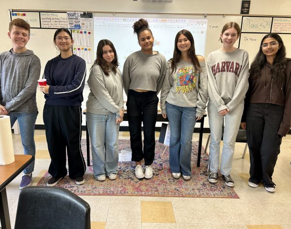 Mock Trial takes a group photo during a meeting. Those pictured from left to right are Daniel Ashlock, Ai-Tam Huynh, Carlin Spencer, Samara Allen Lanum, Kaiya Barris, Lyla Daniel, and Suhani Kamal.