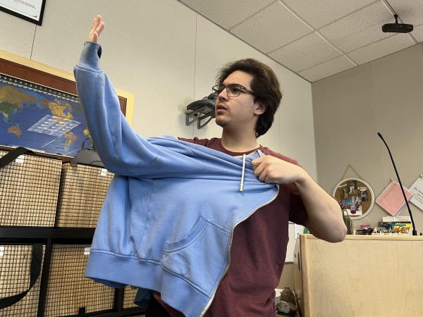 Jacob Lawrence fails to put on a jacket for the rainy days. Mission Hills has been experiencing inclimate weather and many students are unprepared in dressing for the occasion. Its still better than a sunny day, senior Chris Ornelas said.