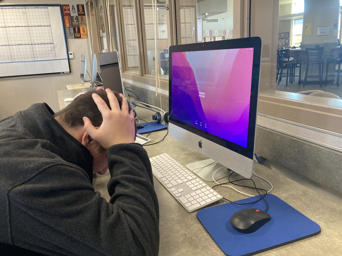 Jason Faulkner is stressed out during class because his attention was diverted to his electronics throughout the week. Faulkner, has been on his phone and is now trying to improve his grade because it went down. "My grade has been going down because of being on my phone," said freshman Faulkner.