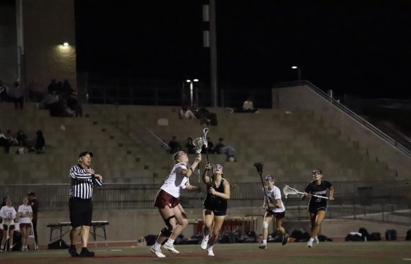 Mission Hills Girls lacrosse fights against Sage Creek. Senior Lucy Garrity, preparing to catch the lacrosse ball and dominate the field. I have an advantage because Im like 6 feet tall, said Garrity.