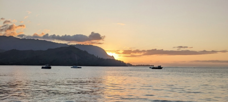 The sun sets over Hanalei Bay on a spring evening. Watching sunsets is a great way to get centered at the end of a long day, freshman Belen Novelo said.