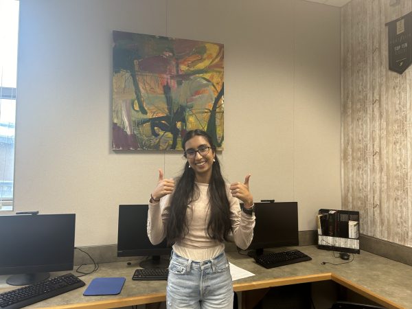Shagun Kamboj, a senior at MHHS who is also the president of the marching band, gives two thumbs up. Kamboj showed how she is prepared to move on from high school to college with feelings of excitement. I cant wait to experience how college life is! said Kamboj.